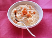 Tomato mayonnaise in bowl with spoon