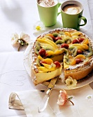 Baked cheesecake with fruit; coffee