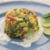 Tomato and avocado tartare with herb sauce