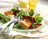 Mixed salad leaves with salmon and sprouts
