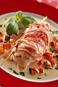 Stuffed chicken breast wrapped in bacon