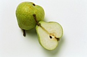 Two pears, one halved