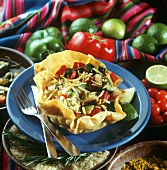 Tacos with vegetables, rice and cheese