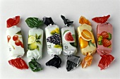 Colourful fruit sweets in a row