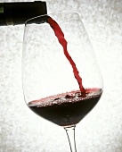 Pouring red wine