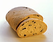 Olive bread with a slice cut