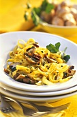 Ribbon noodles with mushrooms and pine nuts