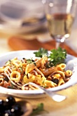 Pasta ai calamari (Penne with squid and vegetable ragout)