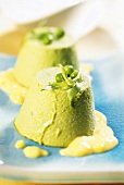 Pea flan with fresh tarragon on pepper whip