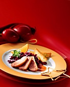 Duck breast with red cabbage and roast potatoes