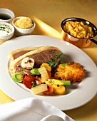 Boiled beef with rosti and vegetables