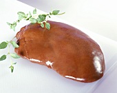 Goose liver on chopping board