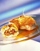 Veal cutlet with stuffed omelette roll