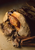 Cinnamon chicken in clay crust