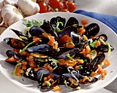 Mussels with tomatoes, onions and herbs