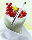 Fresh berries with sugared vanilla pod
