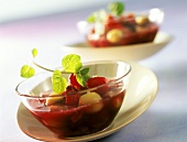Prosecco soup with fruit and mint leaves