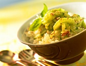 Cucumber salad with sesame and chili on rice