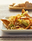 Fried noodles with turkey and spring onions
