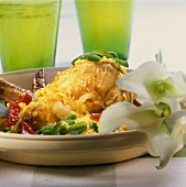 Rice with chicken on plate; decoration: orchid