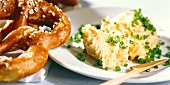 Obatzda (cheese spread) with chives and pretzel