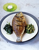 Fried bream with spinach