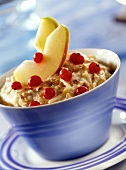 Crunchy muesli with apple, banana and redcurrants