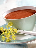 Creamed beetroot soup in blue cup