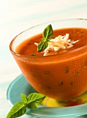 Quick tomato soup with cheese and basil