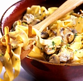 Ribbon pasta with mushrooms and parsley