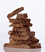 Pieces of Milka chocolate in a pile
