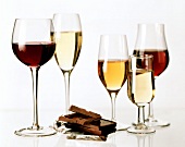 Various wine glasses and Milka chocolate