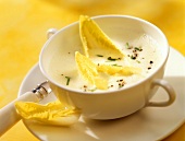 Chicory soup with chives in soup cup