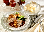 Stuffed duck breast in red wine sauce; Emmental cheese