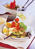 Crepes with asparagus and avocado salad and egg