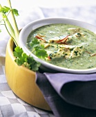 Spinach and coconut soup with chicken breast