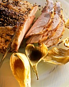 Roast veal, carved, with garlic