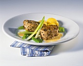 Pork fillets with pepper crust and spring onions