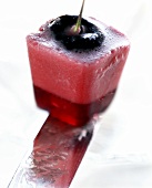 Cherry in cube of cherry jelly and cherry yoghurt mousse