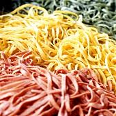 Home-made ribbon pasta in various colours