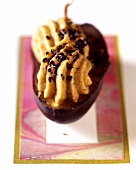 Stuffed date with mousse and chocolate sauce