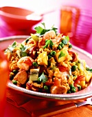 Fruity rice with turkey and prawns with peas