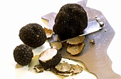Black summer truffle with slicer