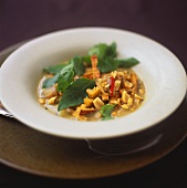 Tofu and peanut curry with fresh herbs