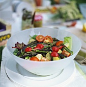 Green asparagus salad with radishes and tomatoes