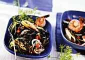 Black pasta salad with seafood
