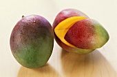 Mango (Kent variety) with drops of water