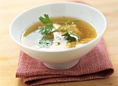 Vegetable broth with egg and parsley (egg drop soup)