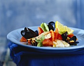 Sole with mussels and tomatoes