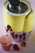 Strawberry juice with juicer